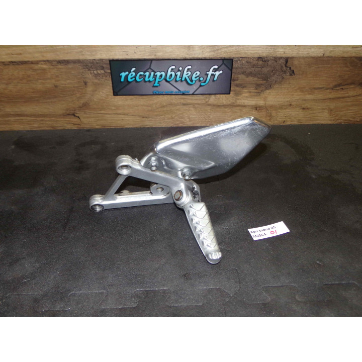 Platine repose pieds gauche Aprilia Tuono 2005